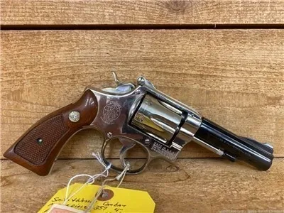 Smith & Wesson Combat Masterpiece MFG 1952 .38 spec 4" Nickel Frame - USED