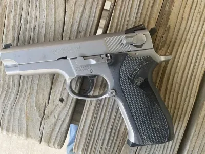 Smith & Wesson Model 5906, 9mm, 1-15rd mag, PENNY START! Current Bid $305.00 4d 18h | 9 Bids